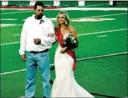  ??  ?? Farmington senior queen candidate Shayley Treat, daughter of Wade and Jennifer Treat, escorted by her father, Wade Treat.