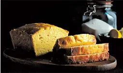  ?? E. JASON WAMBSGANS/CHICAGO TRIBUNE; JOAN MORAVEK/FOOD STYLING ?? Lemon juice melted into granulated sugar forms a thin, shiny syrup that soaks into the loaf, bolstering its potency and imparting a glamorous gloss.