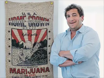  ?? CHARLES REX ARBOGAST
THE ASSOCIATED PRESS ?? Ben Kovler, CEO of Green Thumb Industries, poses for a portrait at the company's office in Chicago. Last month, the company with $20 million in revenue from pot shops in seven states turned its gaze north and went public in Canada, where marijuana soon...