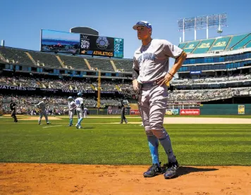  ?? Photos by Gabrielle Lurie / The Chronicle ?? The Yankees’ Aaron Judge has stats to match his stature — the 6-foot-7, 282-pound rookie leads the majors in homers (23) and has the fourth-best average (.335) — yet deflects credit to his mom.