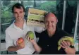  ??  ?? HUNGRY TO HELP: Benjamin Constable, left, and Colin Francke have boxes of fresh fruit to feed your family and a child in need.