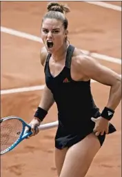  ?? Thibault Camus Associated Press ?? MARIA SAKKARI REACTS during her quarterfin­al victory over defending champion Iga Swiatek.