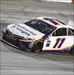  ?? BRYNN ANDERSON / ASSOCIATED PRESS ?? Denny Hamlin, who also won the Daytona 500 this year, earned his third career win at Darlington Raceway on Wednesday after the race was stopped by rain with 20 laps remaining. It was NASCAR’s first Cup race on a Wednesday since 1984.