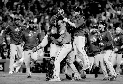  ?? ATT SLOCUM / AP ?? The Houston Astros celebrate their World Series win over the Los Angeles Dodgers on Nov 1. The Dodgers will pay the most luxury tax ($36.2 million) in Major League Baseball again this year, it has been revealed.