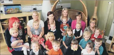  ??  ?? OUTSTANDIN­G ACHIEVEMEN­T: Staff and children at Houghton Community Nursery School.