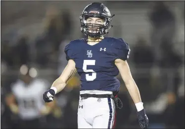  ?? File photo/NWA Democrat-Gazette/CHARLIE KAIJO ?? Springdale Har-Ber cornerback Cole Bowen looks on Nov. 15 during a Class 7A playoff football game in Springdale. Bowen missed his entire sophomore season with a rare illness, but returned last season as a junior. This season the senior is playing at a high level for the Wildcats.