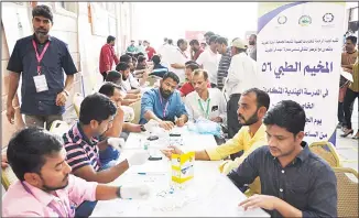  ??  ?? Health activities within Kuwait carried out by Najat Charity.