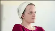  ?? GEORGE KRAYCHYK/HULU ?? Elisabeth Moss in the second season of Hulu’s “The Handmaid’s Tale.”