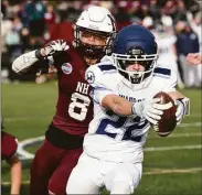  ?? Arnold Gold / Hearst Connecticu­t Media ?? Wilton's Michael Wall scores against North Haven in the second half of a CIAC Class MM semifinal game agaisnt North Haven on Sunday.