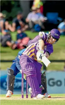  ?? PHOTO: PHOTOSPORT ?? Ben Stokes climbs into the Otago Volts bowling on his way to top scoring for the kings with 93 from 47 balls in Christchur­ch on Thursday night.