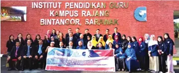  ??  ?? Lambat and Urai (seated, sixth and seventh left, respective­ly) with the students and the lecturers in a group photo.