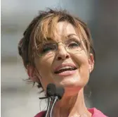  ?? NICHOLAS KAMM/GETTY-AFP ?? Then-vice presidenti­al candidate Sarah Palin speaks in 2015 in Washington. Palin has the biggest national profile in the packed field of candidates.