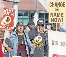  ??  ?? Sticks and stones: The Supreme Court could decide whether these protesters, who want the Redskins’ name changed, will get their way.