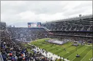  ?? MATT MARTON / AP 2018 ?? The Chicago Bears announced the signing Wednesday of an agreement to purchase Arlington Park racetrack in Arlington Heights, the latest step toward a move from, Soldier Field in Chicago (above).