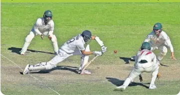  ?? GETTY ?? Ravichandr­an Ashwin was the epitome of concentrat­ion as he smothered Nathan Lyon comfortabl­y throughout the day.