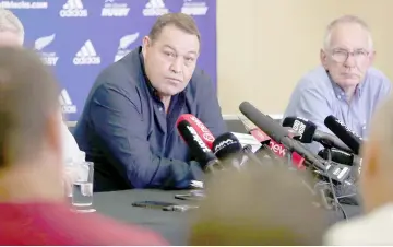  ??  ?? New Zealand All Blacks rugby coach Steve Hansen (centre) attends a press conference in Auckland. — AFP photo