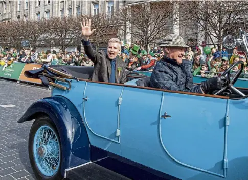  ?? ?? GOING GREEN: ‘Proud’ grand marshal, Patrick Kielty, at yesterday’s St Patrick’s Day Parade in Dublin.