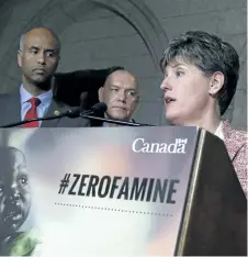  ?? FRED CHARTRAND/THE CANADIAN PRESS ?? Internatio­nal Developmen­t Minister Marie-Claude Bibeau, right, talks with reporters as Immigratio­n Minister Ahmed Hussen, left, Red Cross Canada president Conrad Sauve look on Monday in Ottawa.