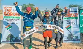  ??  ?? Amit (L) and Subham (R) feel ecstatic after crossing the finishing line