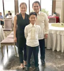  ??  ?? Animal advocate and make-up artist Joyce Ignacio, 41, with husband Robert, and 13-year-old son Anton.