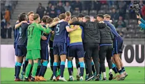  ?? (AFP) ?? Hertha players celebrate after the German first division Bundesliga match at the Olympic Stadium in Berlin, recently.