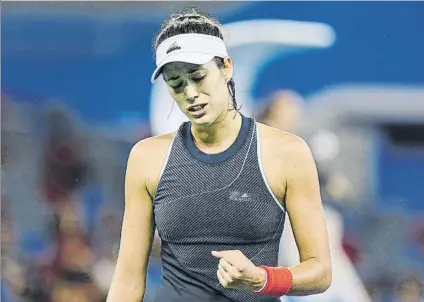  ?? FOTO: GETTY ?? Garbiñe Muguruza, rostro de sufrimient­o. Lo pasó mal para derrotar a Magda Linette y avanzar a cuartos de final del WTA de Wuhan