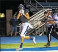  ?? NATE HECKENBERG­ER — FOR DIGITAL FIRST MEDIA ?? Owen Banavitch of Great Valley pulls in a 22-yard touchdown reception from Jake Prevost at the end of the first half against Kennett.