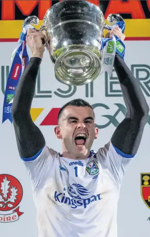  ??  ?? Glory day:
Cavan captain Raymond Galligan proudly holds the Ulster trophy aloft