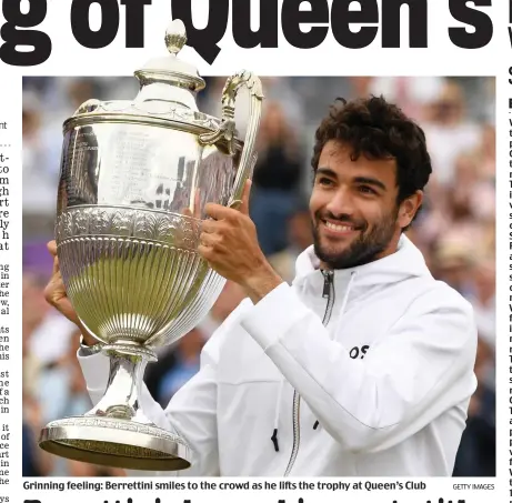  ?? GETTY IMAGES ?? Grinning feeling: Berrettini smiles to the crowd as he lifts the trophy at Queen’s Club