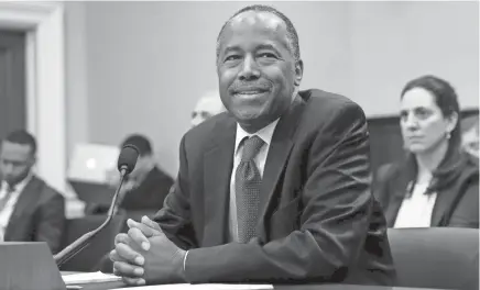  ??  ?? Housing and Urban Developmen­t Secretary Ben Carson takes his seat March 20 before testifying before a House Committee on Appropriat­ion subcommitt­ee hearing on Capitol Hill in Washington. PABLO MARTINEZ MONSIVAIS / AP