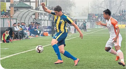  ??  ?? Mason Robertson in action on his debut for Real Kashmirand, below, his dad in action for Rangers