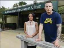  ?? DAVID DERMER - THE ASSOCIATED PRESS ?? Niki Campana, left, and Paul Wright stand together outside the Neil Kennedy Recovery Clinic, June 15, in Youngstown, Ohio. Republican efforts to roll back “Obamacare” are colliding with the opioid epidemic. Cutbacks would hit hard in states that are...
