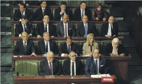  ?? EPA ?? A Tunisian Parliament session this month. Yesterday Interior Minister Hichem Fourati denied claims that documents on an alleged secret group run by Ennahda had been kept from the judiciary. Lawyers have threatened to release the files