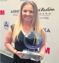  ??  ?? ●●Bronte Law with the Annika award