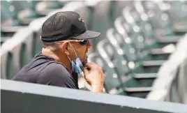  ?? JULIO CORTEZ/AP ?? Orioles manager Brandon Hyde watches his team work out Monday in Baltimore.