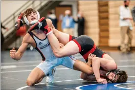  ?? NATE HECKENBERG­ER - FOR MEDIANEWS GROUP ?? Boyertown’s Chance Babb fights off Northampto­n’s Christian Fritz in a win by fall in the 138-pound consolatio­n semifinal.