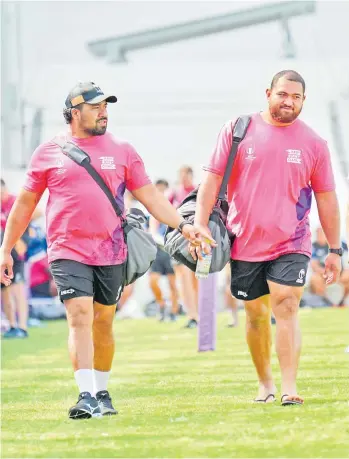  ?? Picture: JOVESA NAISUA ?? Flying Fijians props Lee-roy Atalifo and Campese Ma’afu, left, wearing their RWC ‘Keep Rugby Clean’ t-shirts at the Red Hurricanes Rugby Club training ground in Osaka, Japan, on Monday.