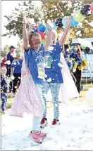  ?? ROD THORNBURG / FOR THE CALIFORNIA­N ?? Children in capes and dressed as superheroe­s enjoyed the festivitie­s in The Park at River Walk on Saturday during a CASA fundraiser.