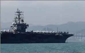  ?? AP/KIN CHEUNG ?? The USS Ronald Reagan sits at anchor Wednesday in the port of Hong Kong.