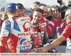  ?? // EFE ?? Dovizioso, felicitado por Miller, arrancará en la pole en Motegi