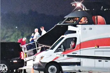  ?? — Reuters photo ?? A person believed to be Otto Warmbier is transferre­d from a medical transport airplane to an awaiting ambulance at Lunken Airport in Cincinnati, Ohio, US.