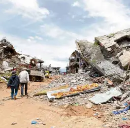  ??  ?? BATTLE-SCARRED In this file photo, houses along Marawi’s lakeside were destroyed in the aftermath of the 2017 fighting between government forces and Islamic militants.