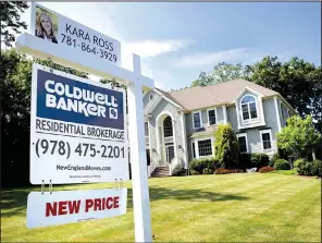  ?? AP/ELISE AMENDOLA ?? This house in North Andover, Mass., was for sale on July 10. Sales of previously owned houses fell 1.8 percent in June, the National Associatio­n of Realtors reported Monday.