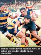  ??  ?? Trinity second rower Randika Alwis in action at a Bradby Shield Rugby encounter.