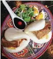  ?? J.C. Reid ?? Soy-sauced-glazed pork belly is a traditiona­l ingredient in many bao offerings.