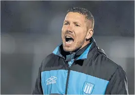  ?? ?? Simeone. Jugaba en Racing y le pidieron que condujera al equipo.