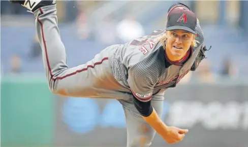  ?? FOTO: AP ?? >Greinke obtuvo su cuarta victoria de la presente campaña de la MLB.