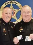  ?? Courtesy ?? Precinct 4 Constable Mark Herman, left, with Chief Deputy Wally Wieghat at Wieghat’s retirement ceremony. He retired after 26 years of service.