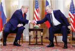  ??  ?? SUMMIT DENOUNCED – Presidents Donald Trump of the US and Vladimir Putin of Russia meet in Helsinki, Finland, in a summit that has been denounced as 'shameful' and 'disgracefu­l' by US intelligen­ce officials and even the president’s partymates. (Reuters)