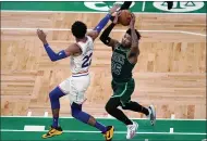  ?? CHARLES KRUPA – THE ASSOCIATED PRESS ?? Celtics guard Marcus Smart, right, tries to maneuver past Sixers guard Matisse Thybulle during at game earlier this month at TD Garden in Boston.